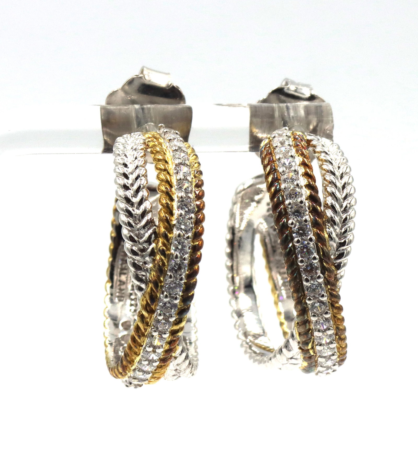 925 Sterling silver Judith Ripka hoop earrings: 925 Sterling silver Judith Ripka hoop earrings. The total weight of the earrings is 15.1 grams.