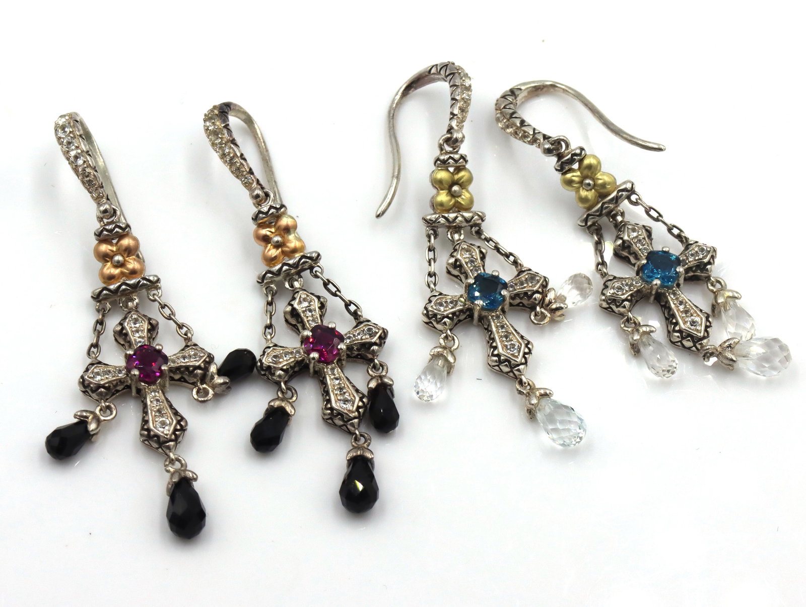 2 Pairs of Barbara Bixby sterling silver blue topaz and garnet Cross dangle earrings: 2 Pairs of Barbara Bixby sterling silver blue topaz and garnet Cross dangle earrings. The total weight of the lot is 16.4 grams.