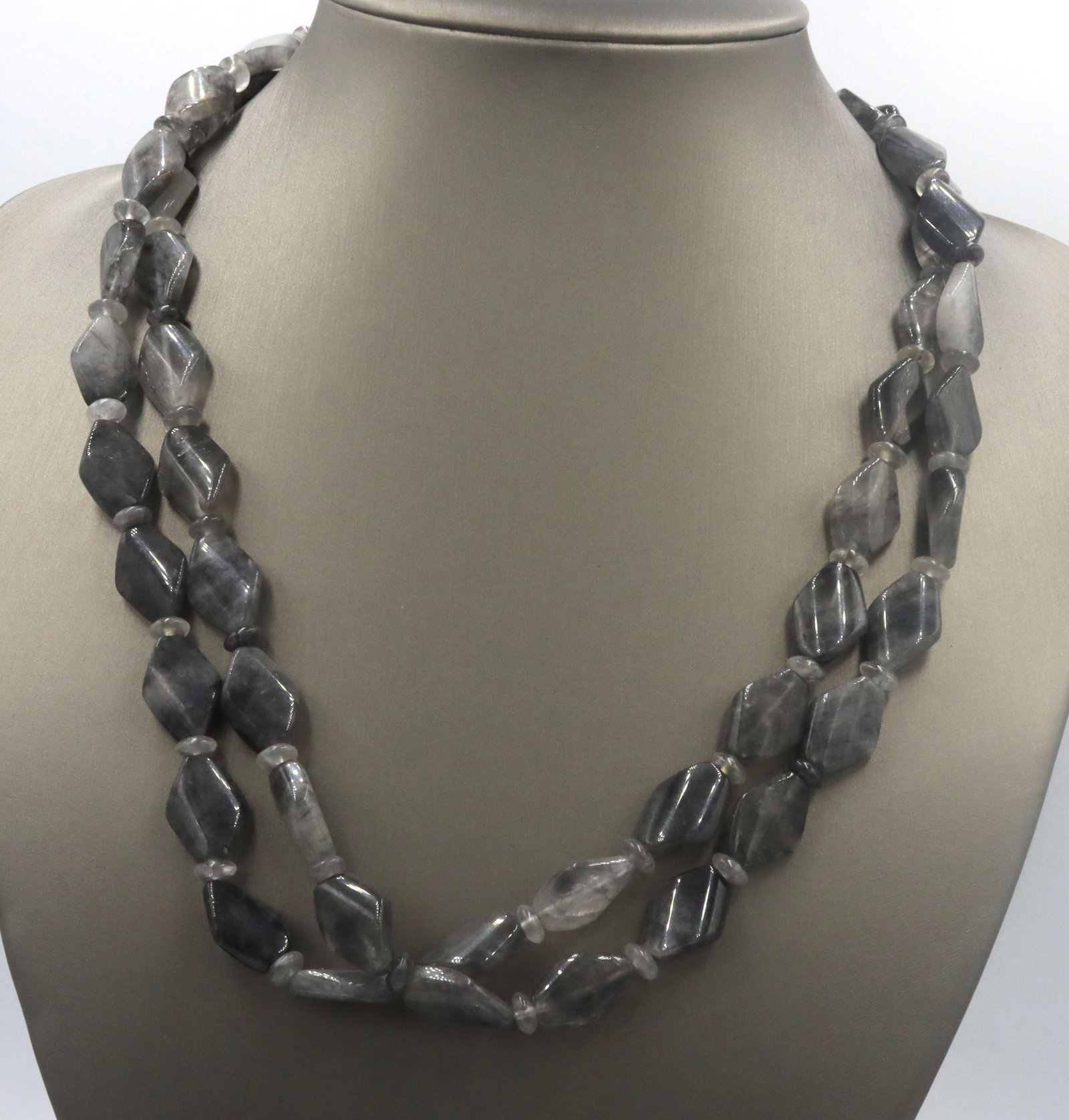 Two row strand smokey quartz necklace: Two row strand smokey quartz adjustable 20-inch necklace with 925 sterling silver clasp. The total weight of the necklace is 74.5 grams.