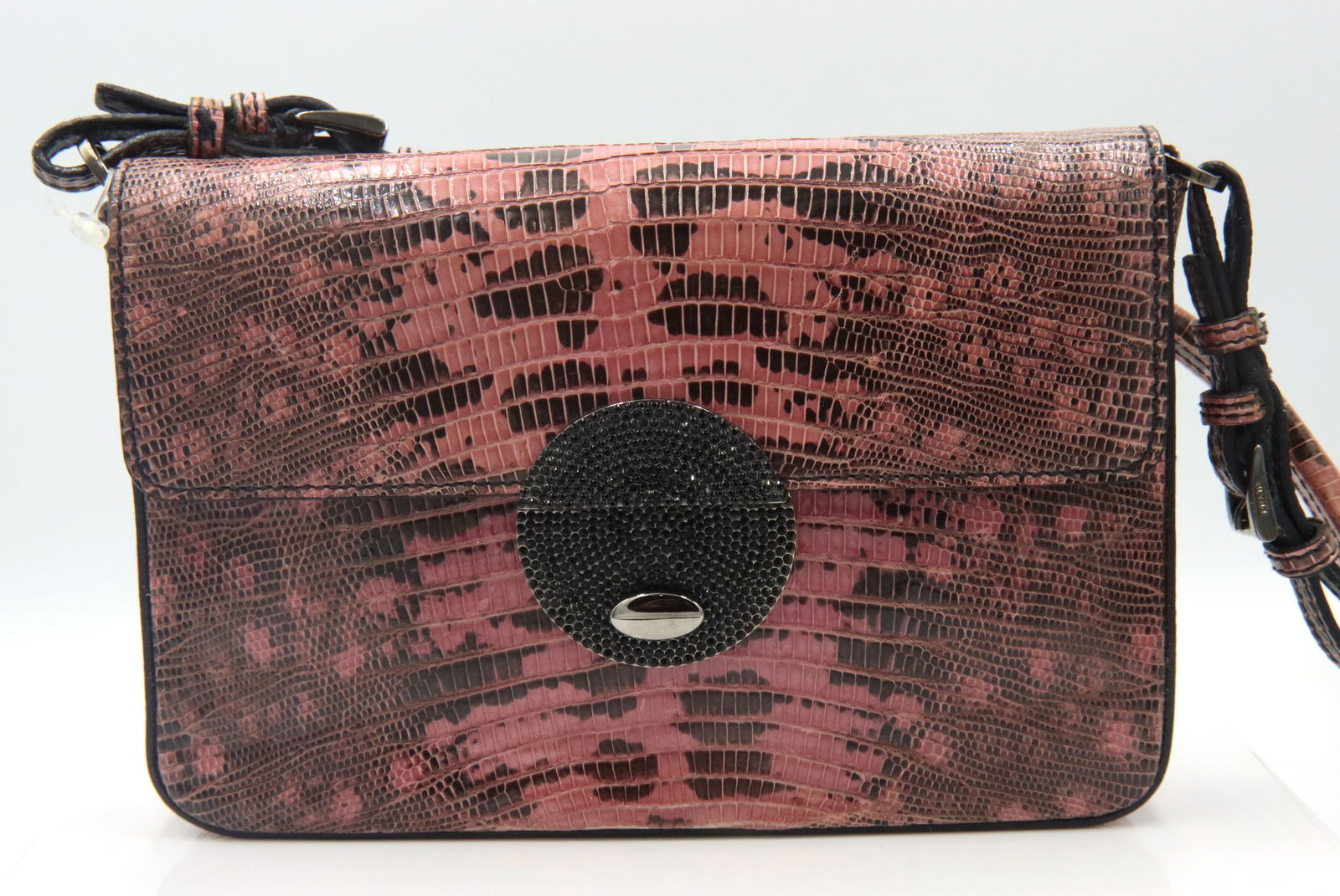 Prada bag: Prada flap top handle bag. Made in Italy.7-inches long.