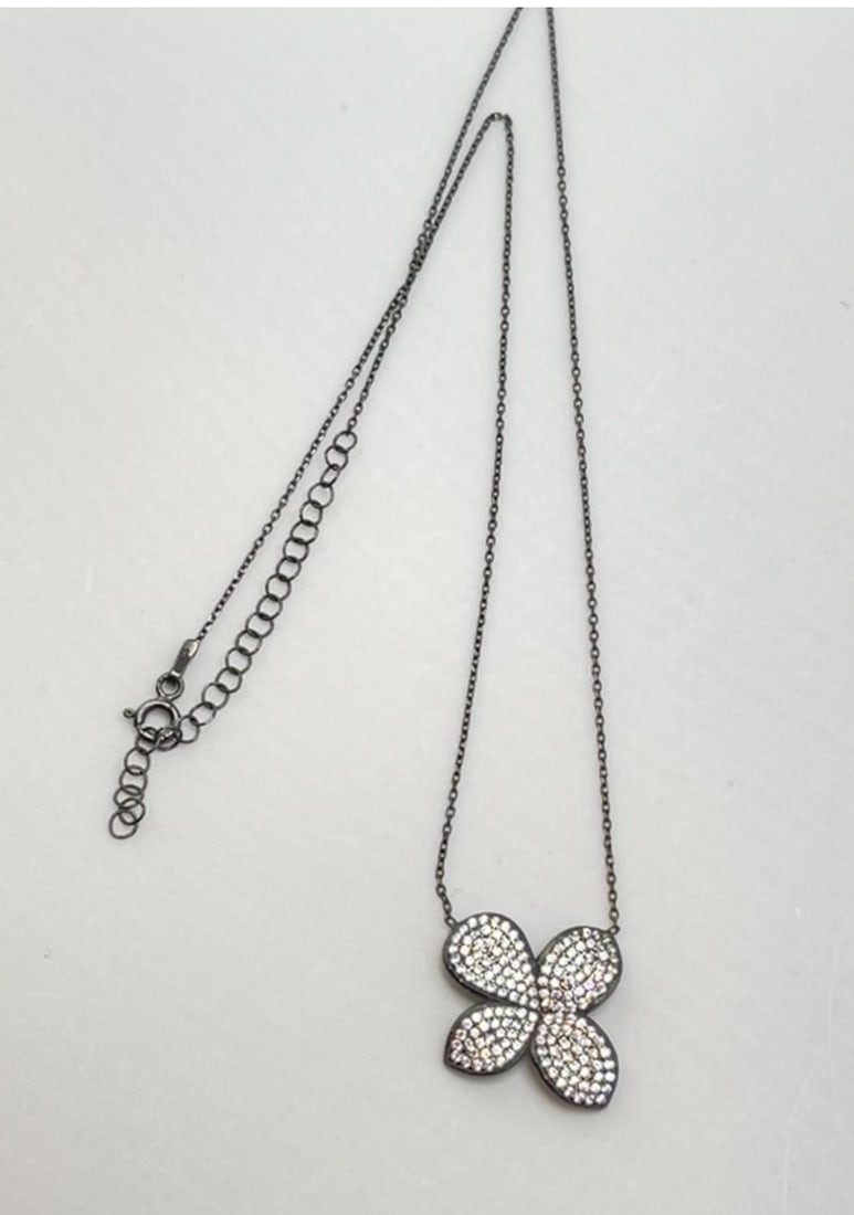 925 Black Rhodium Sterling Silver Fiore Pendant Necklace: 925 black rhodium sterling silver modern fiore cubic zirconia pendant with chain. 4.6 grams. 18 inches
