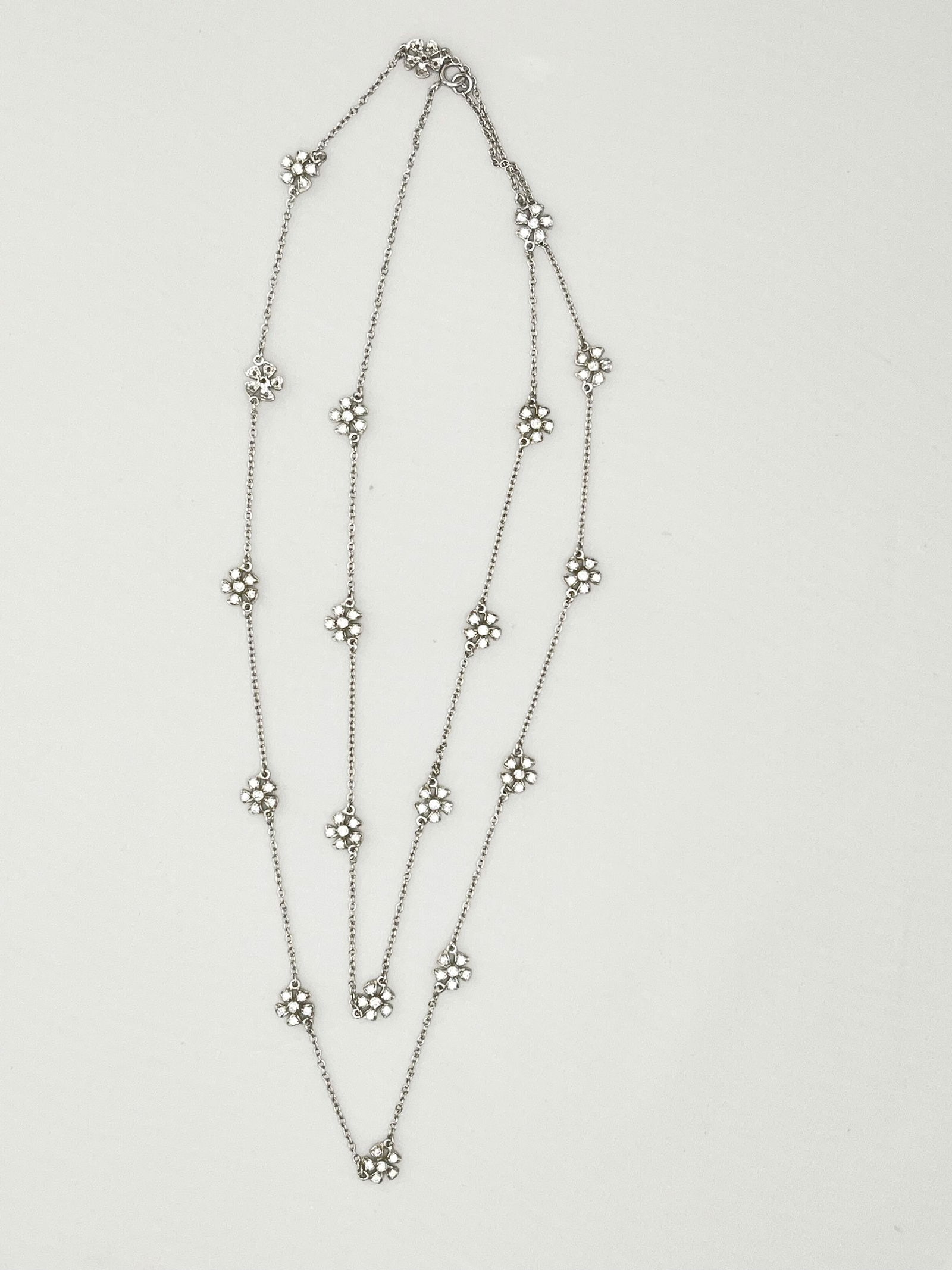 925 Sterling Silver Gardenia Flower Long Necklace with CZ Details: 925 Sterling Silver Gardenia Flower Station Long Necklace With CZ pave. 10.8 Grams