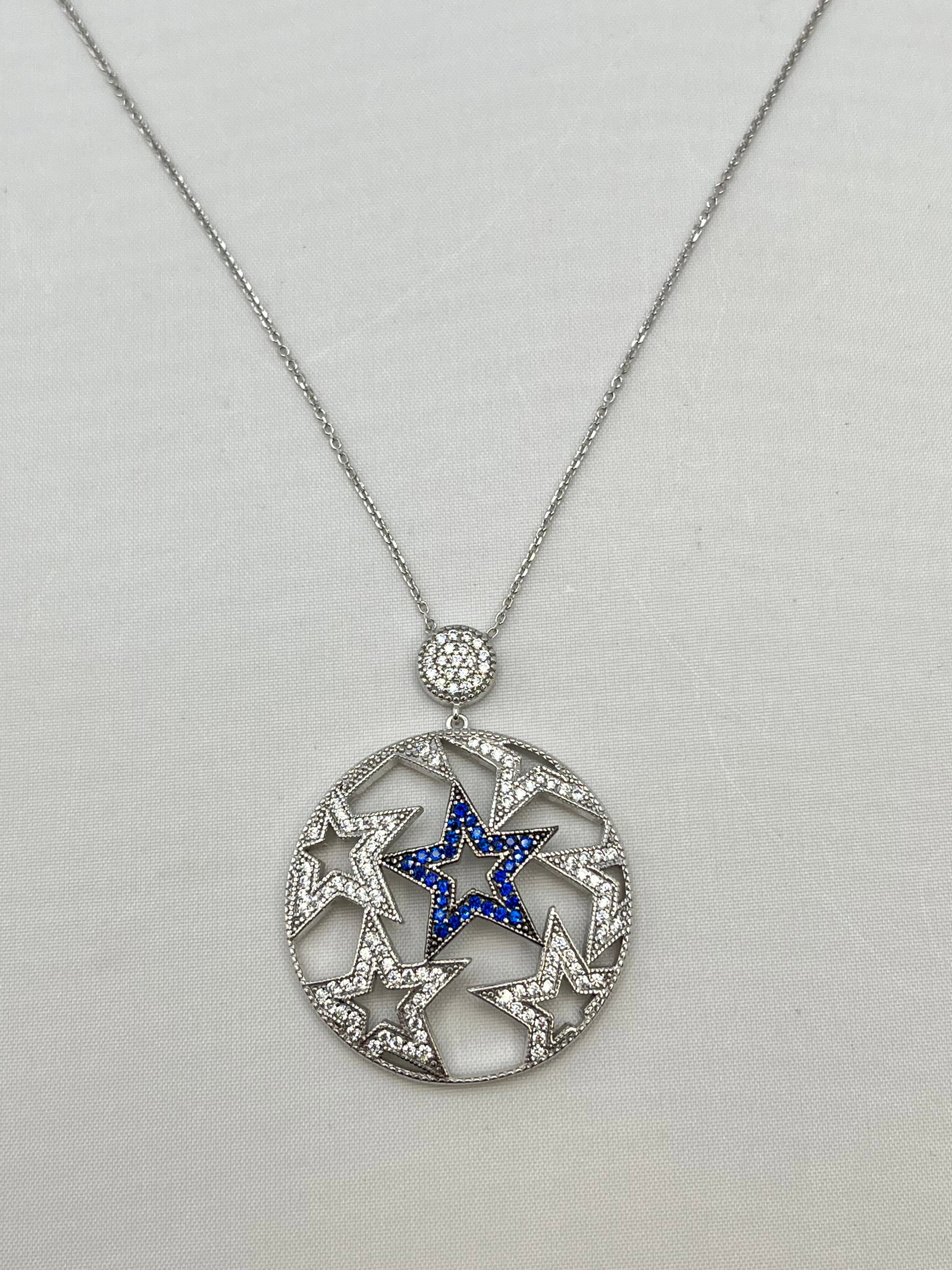 925 Sterling Silver Lucky Star Necklace Clear and Blue Pave Crystal: 925 Sterling Silver Lucky Star Blue And Clear Crystal Necklace. 18 inches, 7.8 grams