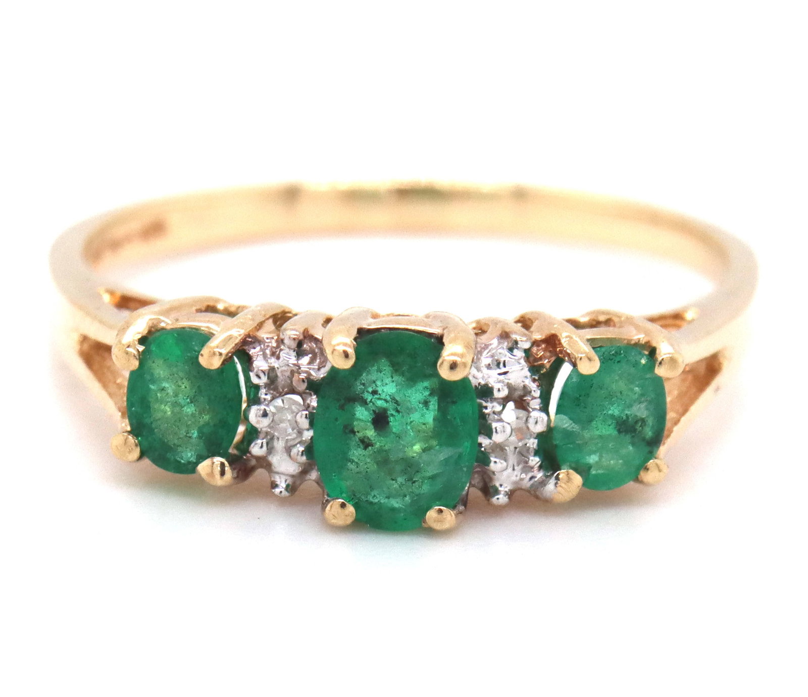 10kt Yellow gold oval emerald and diamond accent 3 stone ring (1 of 4)