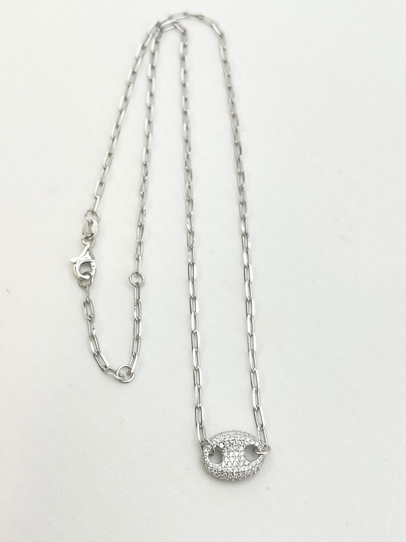 925 Sterling Silver Full Crystal pave Interlocking Circle Pendant With Paperclip Chain Necklace: 925 Sterling Silver Full Crystal Pave Interlocking Circle Pendant With Paoerclip Chain Necklace. 5 grams. 18 inches