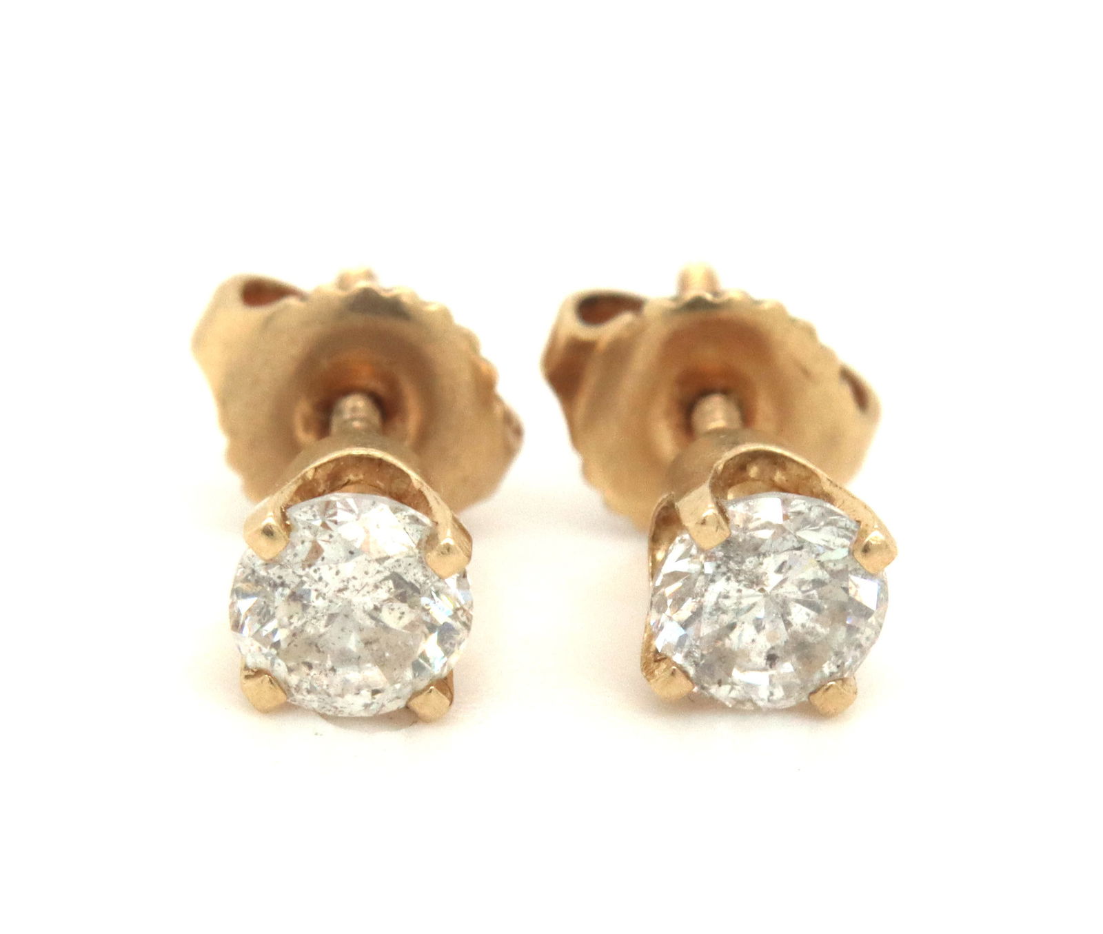 One pair of 14kt yellow gold round brilliant cut diamond stud earrings (1 of 3)