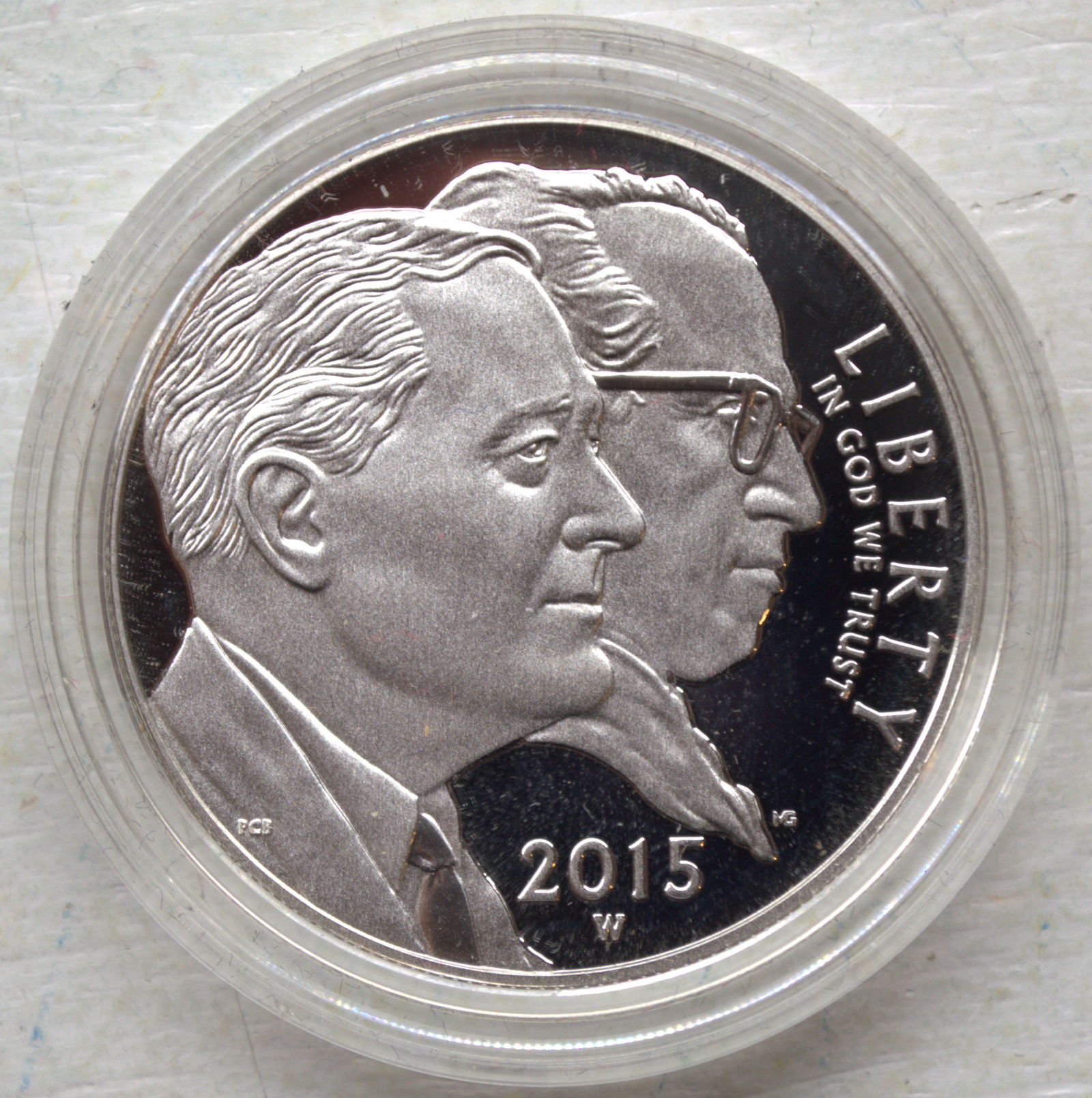 2015-W March of Dimes Proof Silver Dollar – Original Box & COA: This 2015-W March of Dimes Proof Silver Dollar comes in brilliant condition, featuring the iconic design honoring the March of Dimes. Struck in .900 fine silver, this collectible coin is a perfect