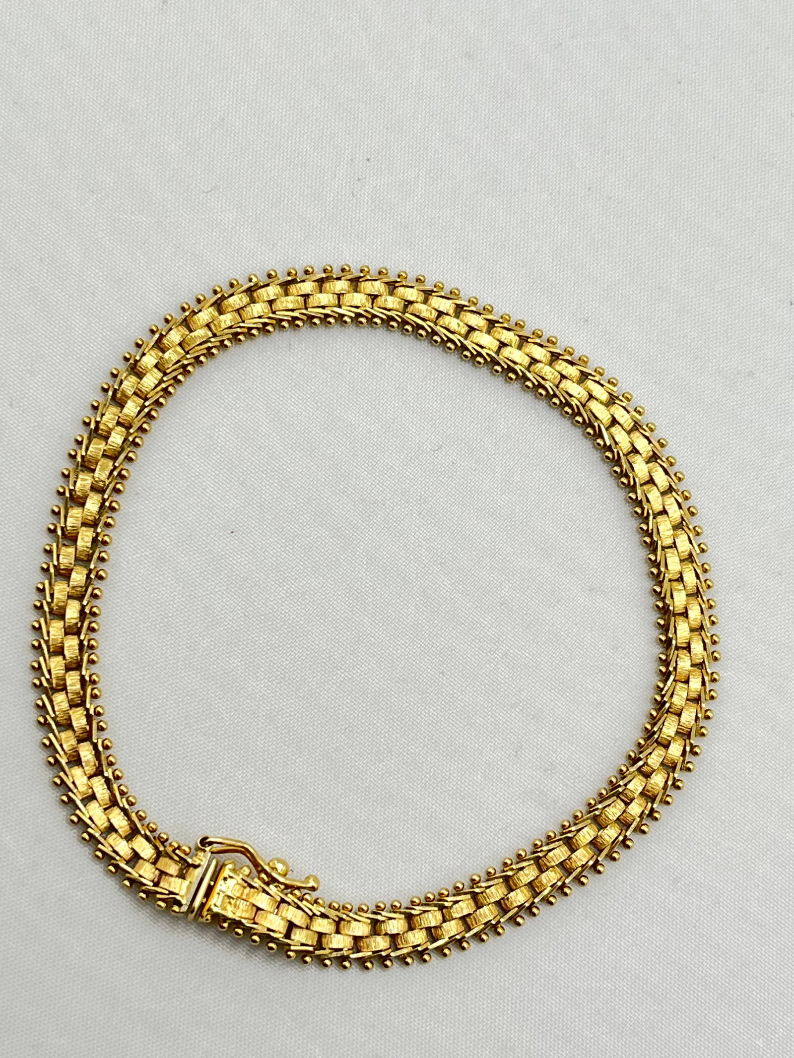 14KT Yellow Gold 6MM Imperial Riccio With Distinctive Beaded Edges Bracelet: 14KT Yellow Gold 6MM Imperial Riccio Polished Diamond Cut Fancy Bracelet With Box Clasp With Safety Catch. 9.6 grams. 7.5 inches