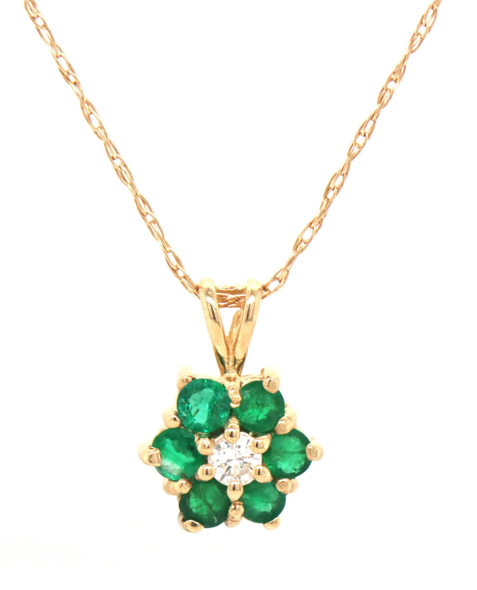 14kt Yellow gold emerald and diamond flower pendant on chain: 14kt Yellow gold emerald and diamond flower pendant on 17-inch chain necklace with spring ring clasp. The total weight of the necklace is 1.50 grams.