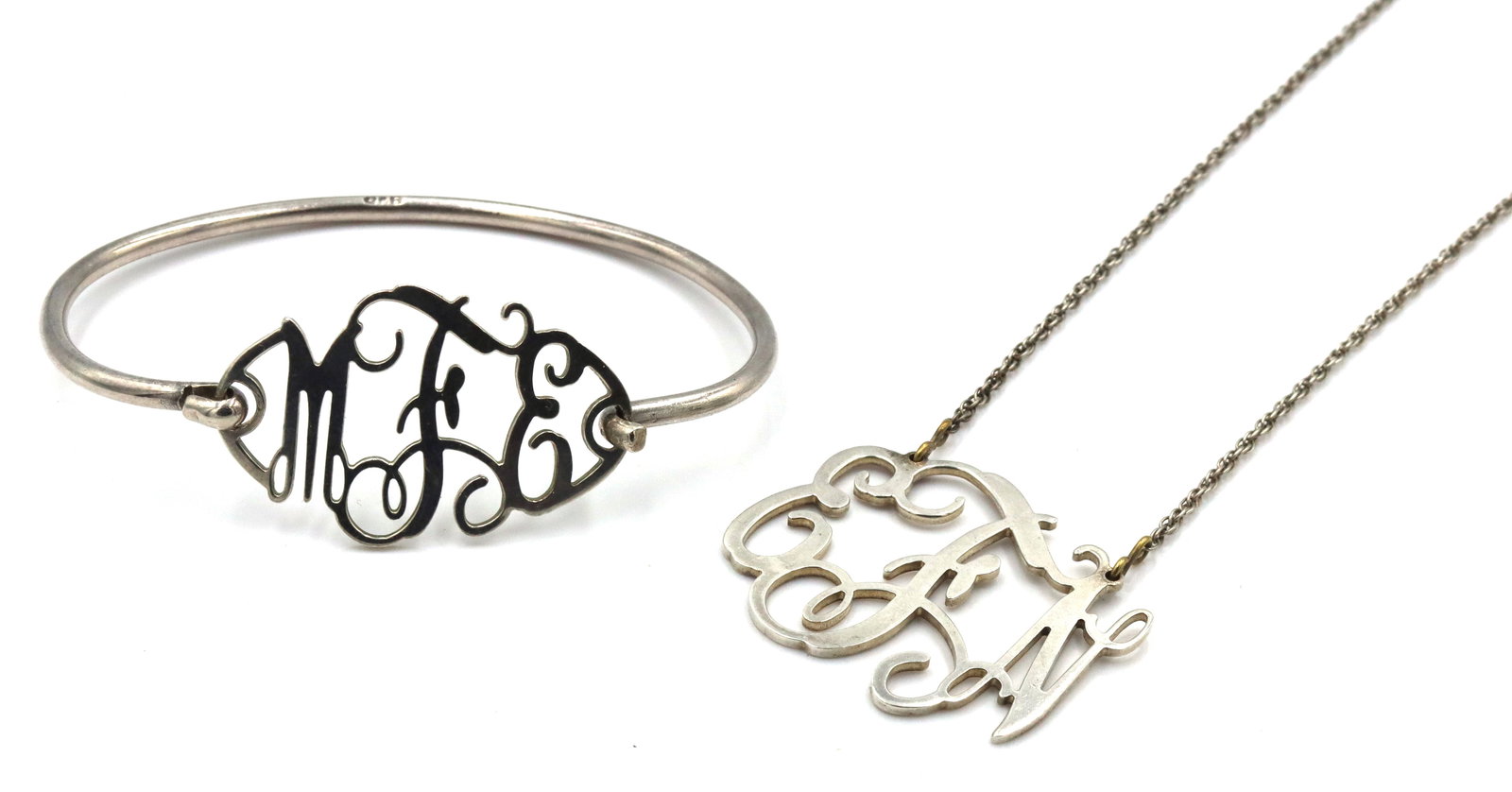 Set of 925 sterling silver Initial cuff bangle and necklace: Set of 925 sterling silver Initial cuff bangle and pendant on 16-inch rope chain necklace. The total weight of the set is 19.3 grams.