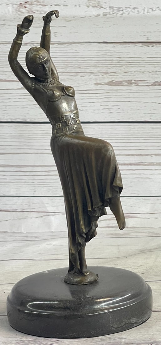 Dancer Bronze Sculpture: The brown flesh tones are actually the amazing applications of a patina blend over bronze. This bronze dancer is using the lost wax method and has a patina blend which will be fused into the bronze to