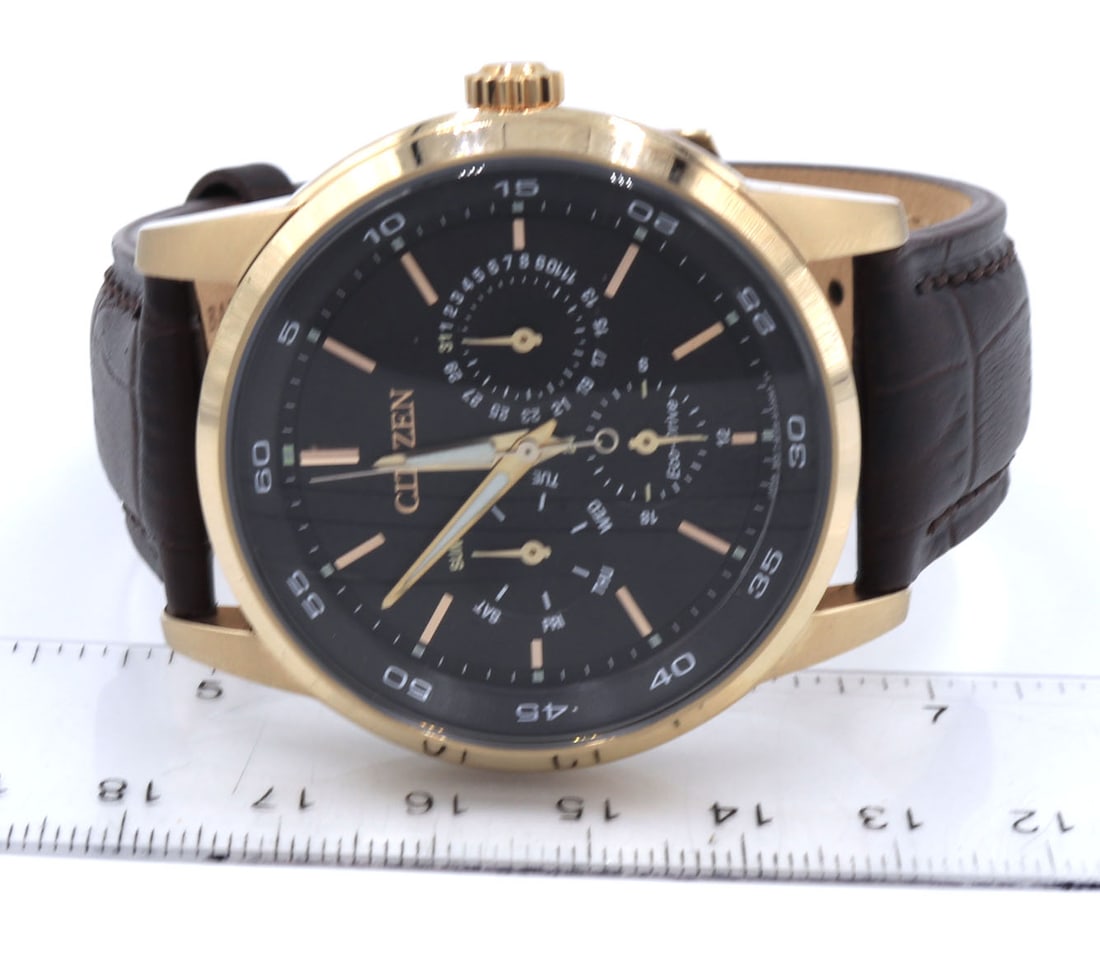 Citizen watch with brown leather strap - 18