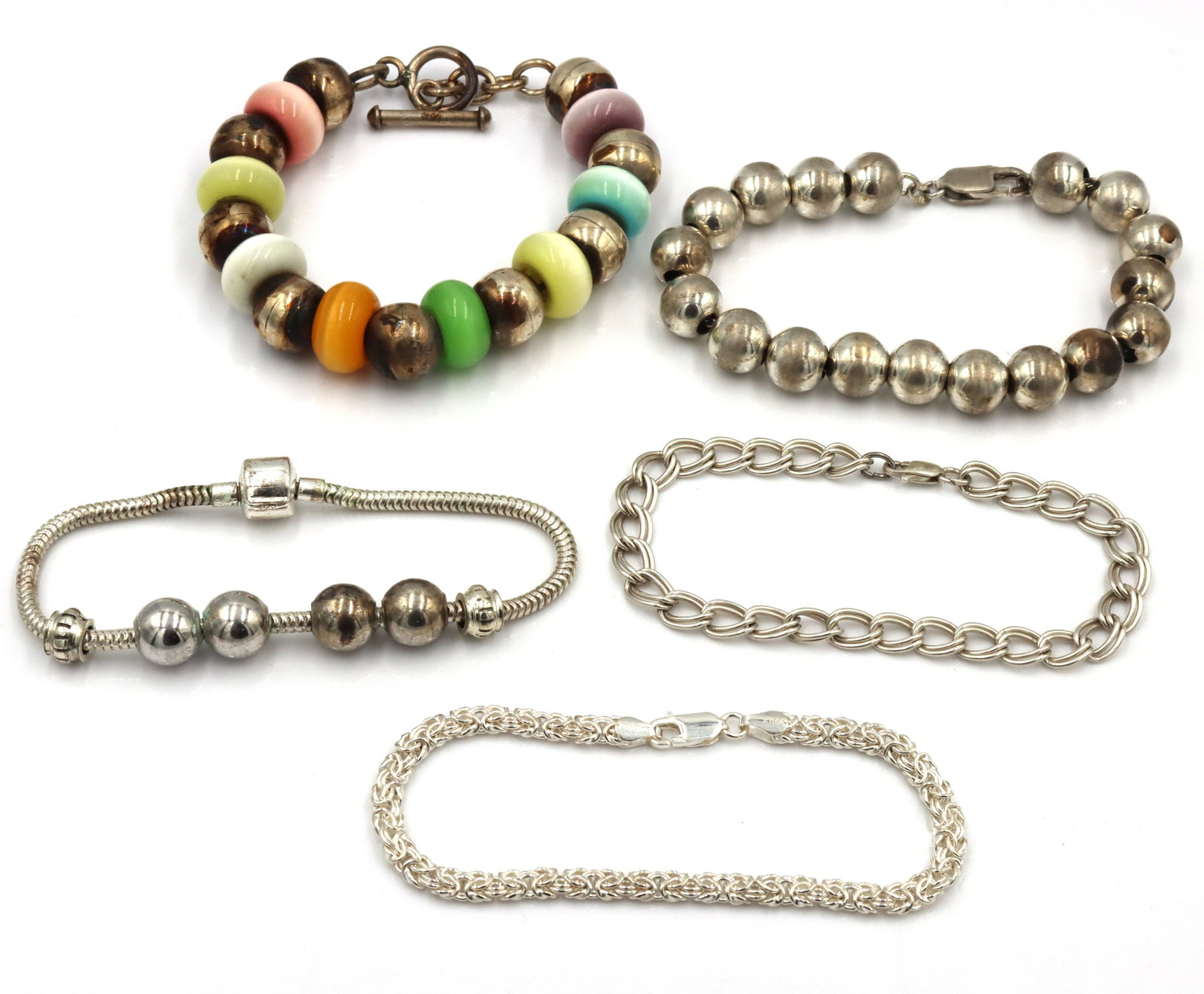 Group lot of 5 vintage 925 sterling silver bracelets: Group lot of 5 vintage 925 sterling silver bracelets. The total weight of the lot is 54.6 grams.