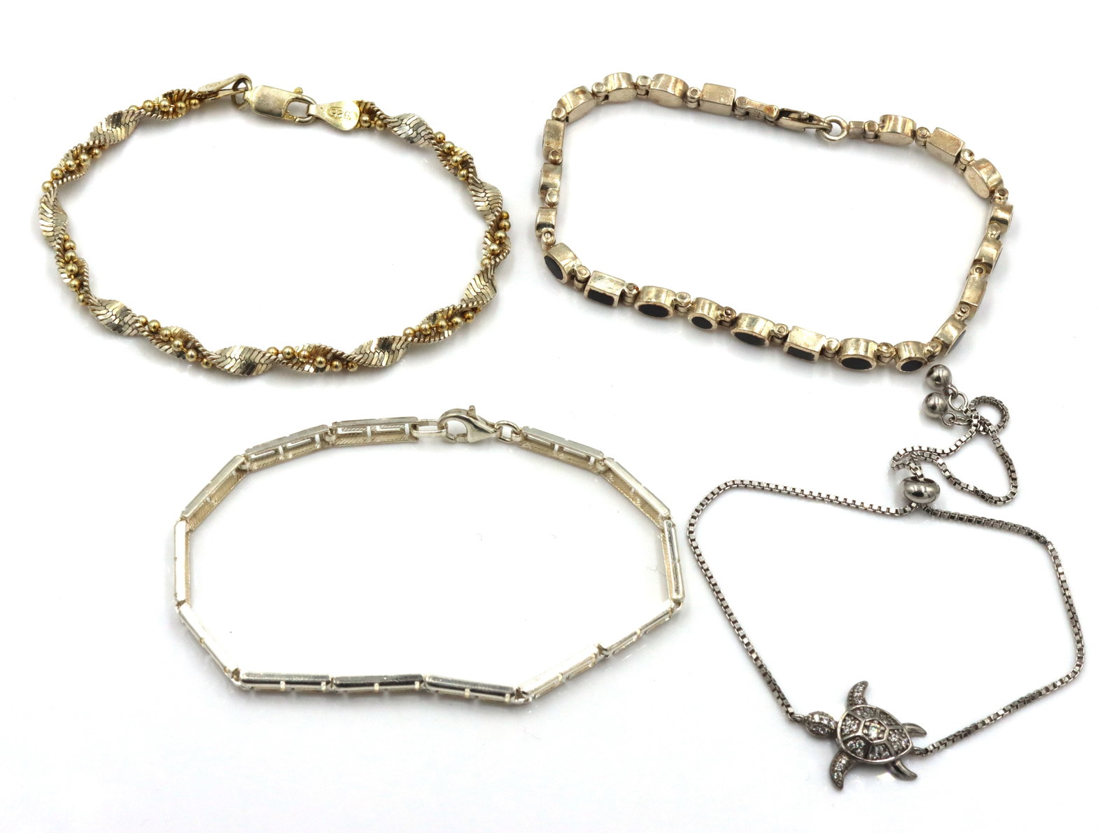 Group lot of 4 Vintage 925 sterling silver bracelets: Group lot of 4 Vintage 925 sterling silver bracelets. The total weight of the lot is 24.8 grams.