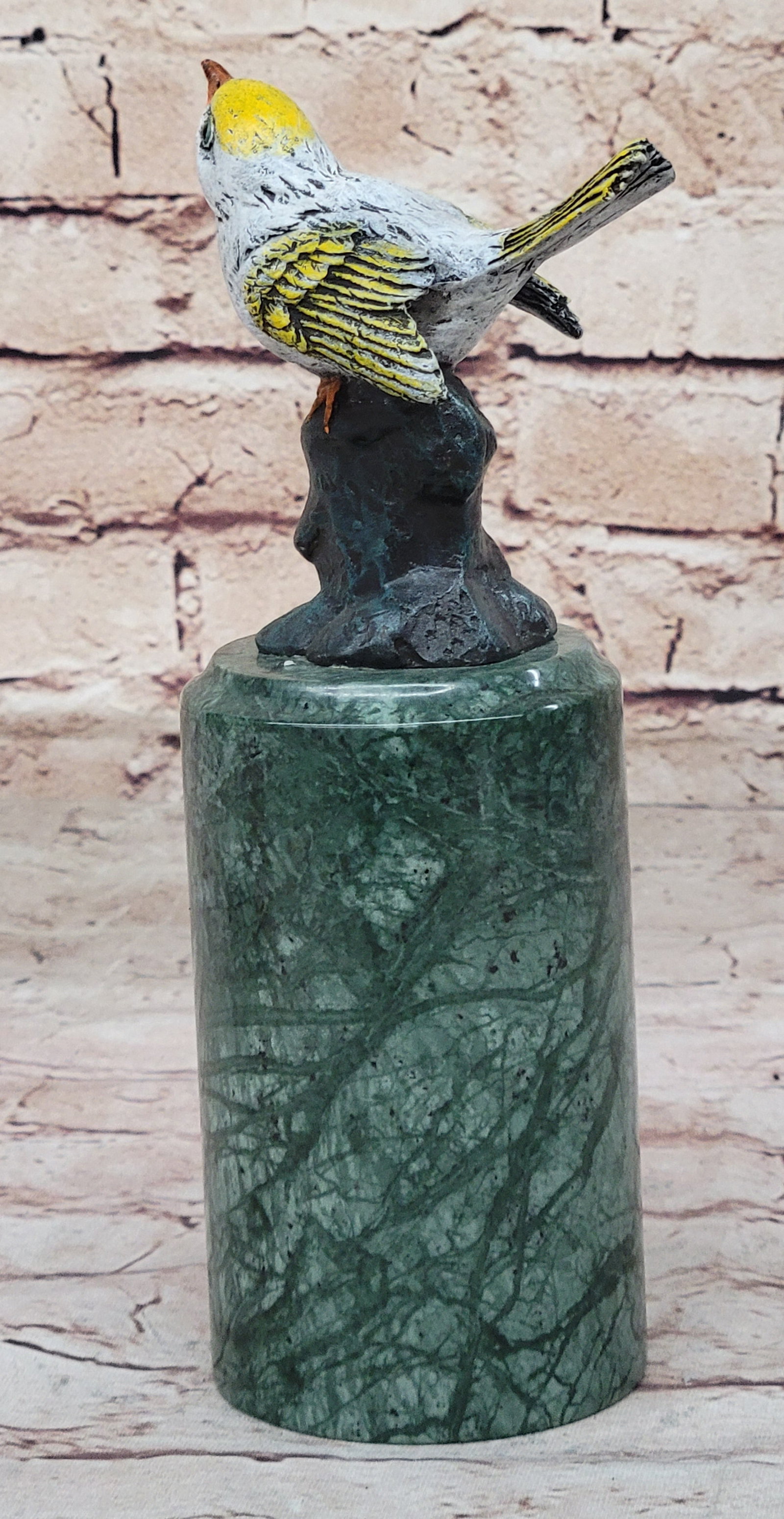 Love Birds Bronze Sculpture: Birds of paradise. Perched on a marble base, the breathtaking multi-color Finches figurines are a testament to natural beauty, featuring wings of vibrantly colored real bronze. It may even be a sweet 