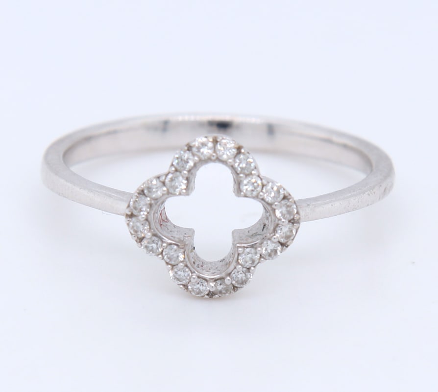 14kt White Gold approximate 0.16ctw Diamond open Ring: Gorgeous 14kt White Gold approximate 0.16ctw Diamond open Ring. Total weight of Ring 2.20 Grams. Ring Size 7"