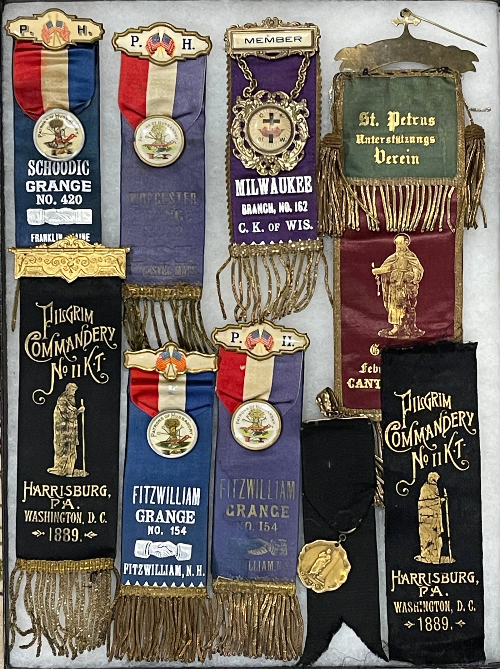 Antique Fraternal Organization Ribbons & Medals Collection (Late 19th ? Early 20th Century): This authentic collection features original antique fraternal ribbons, badges, and medals from prominent American organizations of the late 1800s to early 1900s. Included are pieces from the?Patriotic