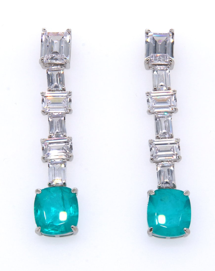 Sterling Silver Green and White CZ Dangle Earrings: 925 Sterling Silver Green and White Cubic Zirconia Dangle Earrings. Total weight of Earrings 10 Grams.