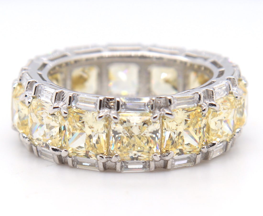 Sterling Silver Princess Cut Yellow Cubic Zirconia Band: 925 Sterling Silver Princess Cut Yellow Cubic Zirconia Band. Total weight of Band 9.30 Grams. Ring Size 7.25"