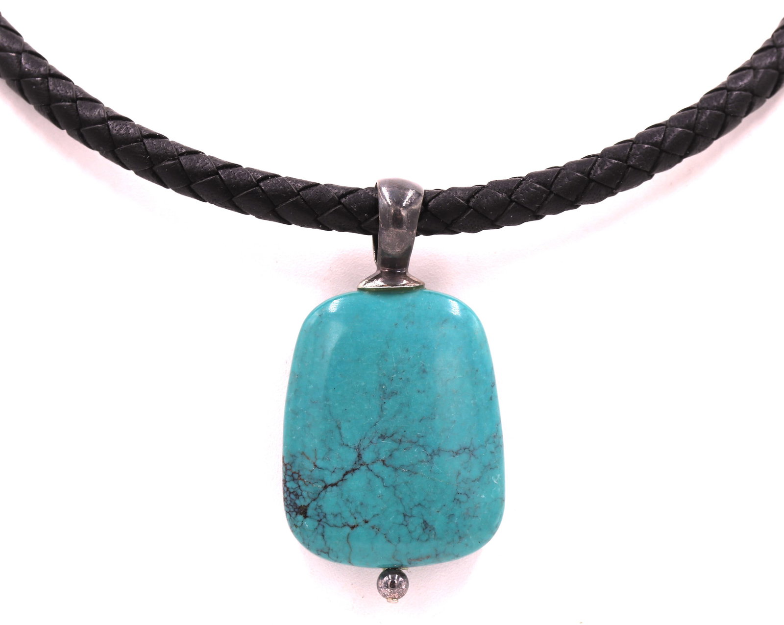 925 sterling silver turquoise pendant with black leather cord: 925 sterling silver turquoise pendant with black leather cord necklace. Total weight of necklace 36.9 grams.