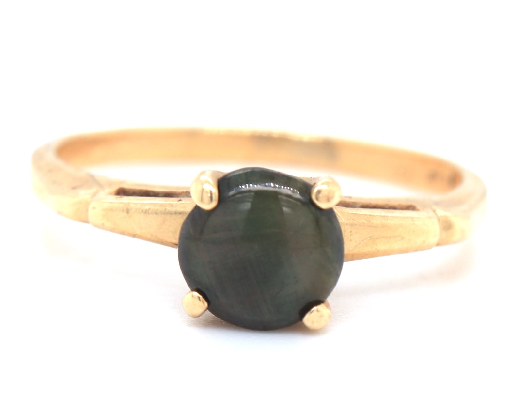 14kt Yellow gold gemstone solitaire ring: 14kt Yellow gold gemstone solitaire ring. Total weight of ring is 2.1 grams. Ring size 6"