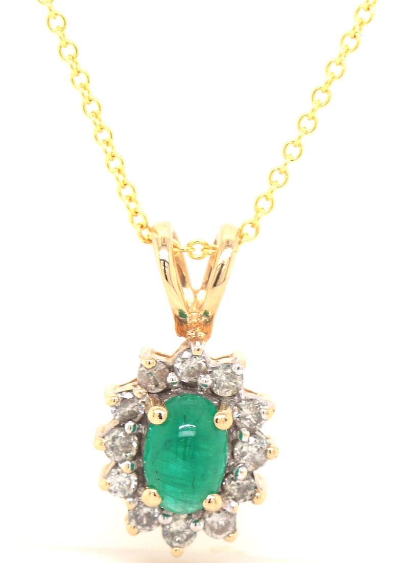 14kt Yellow gold oval Cab Emerald and diamond halo pendant on chain necklace: 14kt Yellow gold oval Cab Emerald and diamond halo pendant on 18 inches chain necklace. Total weight of necklace is 3.10 grams.