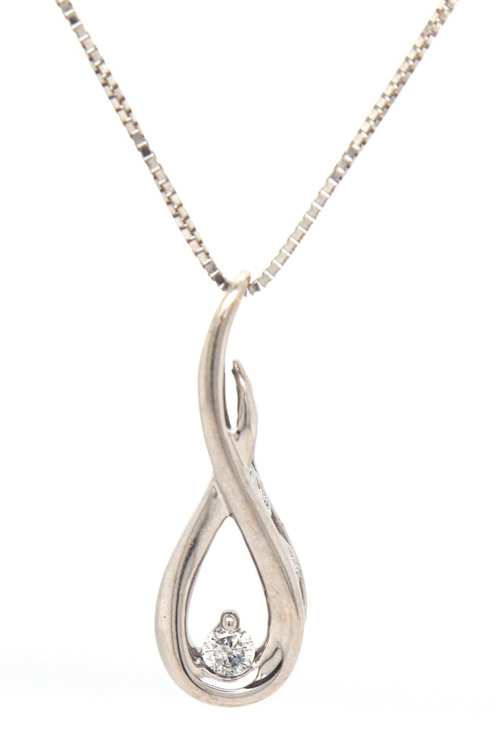 14kt White gold diamond pendant on chain: 14kt White gold diamond pendant on 18 inches box chain necklace. Total weight of necklace is 2.1 grams.