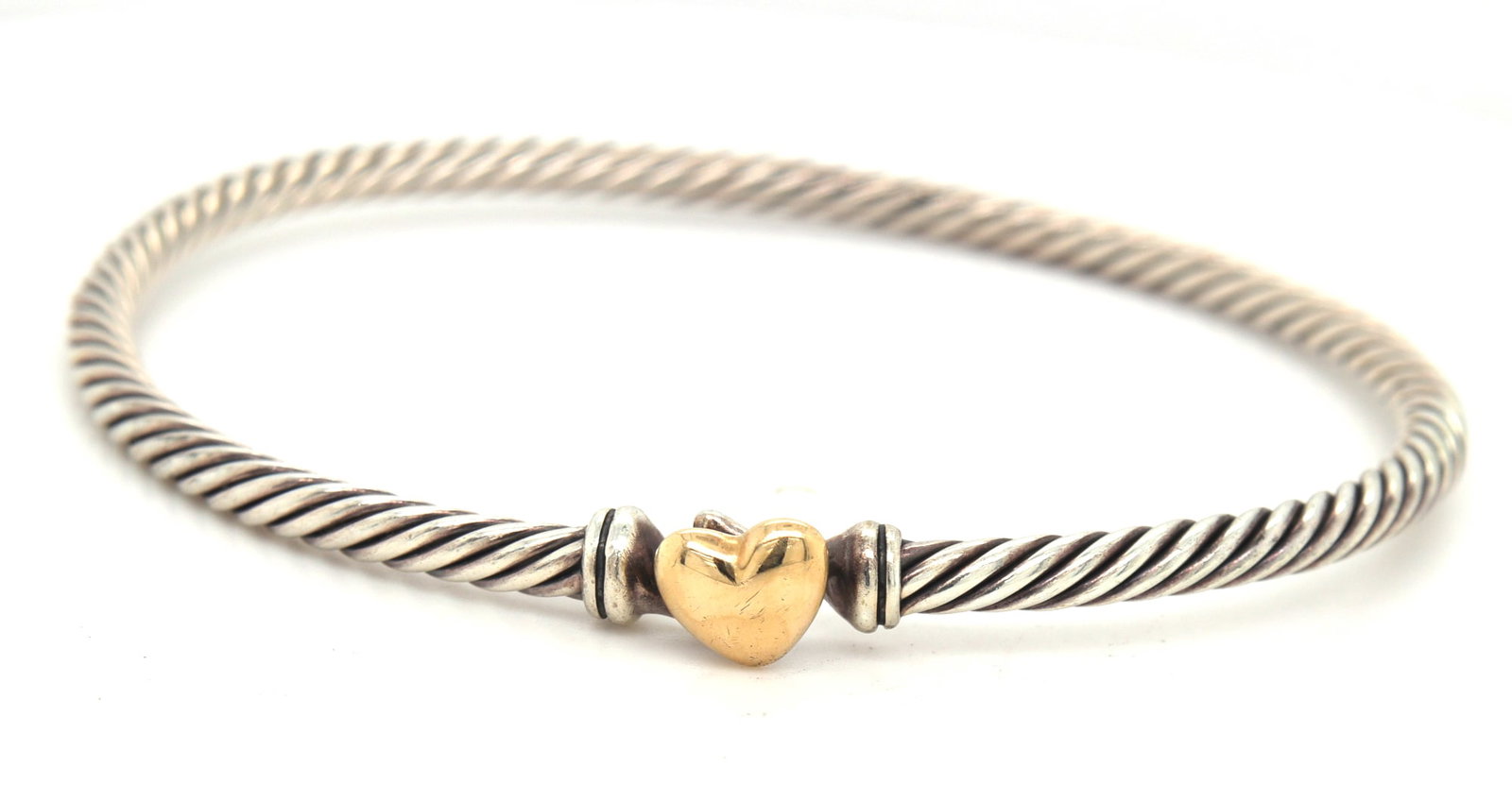 David Yurman cable collectibles heart bracelet 3mm: 925 Sterling silver David Yurman cable collectibles heart bracelet 3mm. Total weight of bracelet is 10.1 grams.