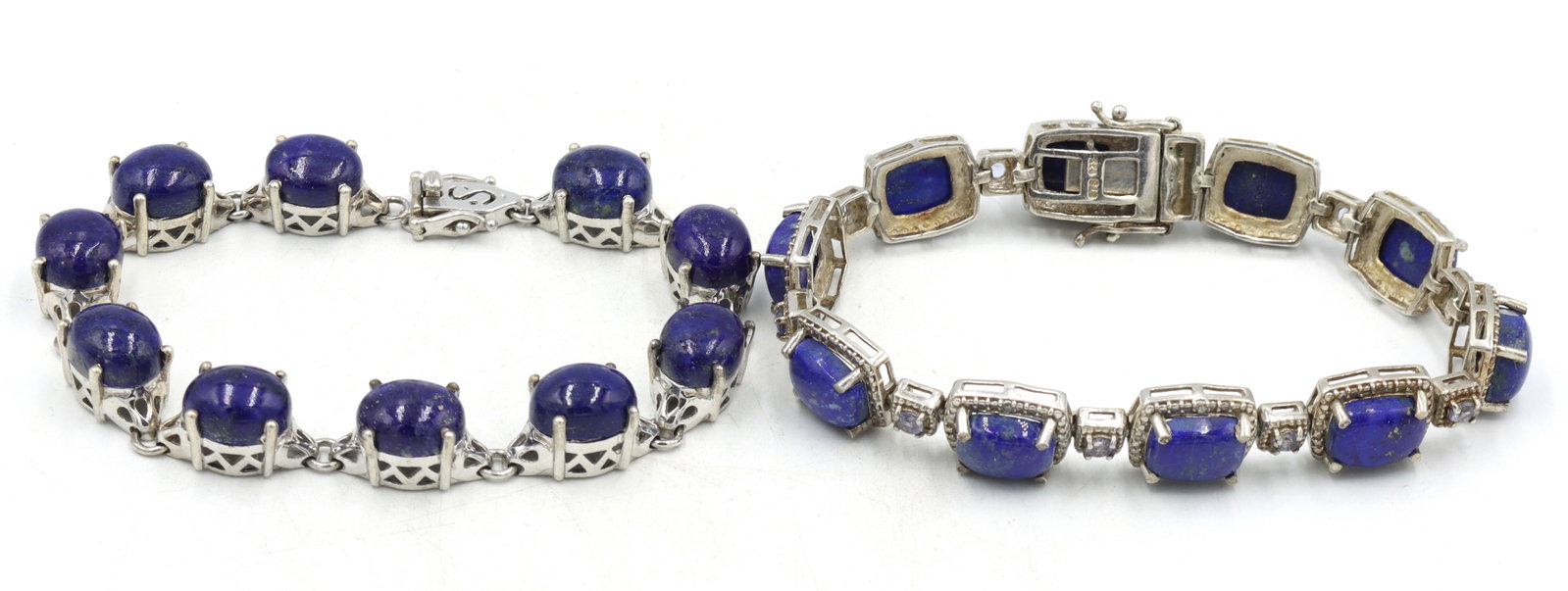 Lot of 2 Vintage 925 sterling silver lapis bracelets: Lot of 2 Vintage 925 sterling silver lapis 7.75 inches bracelets. Total weight of lot is 53.6 grams.