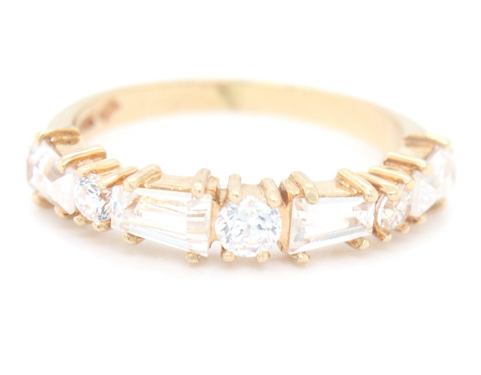 14kt Yellow gold Cubic Zirconia band: 14kt Yellow gold Cubic Zirconia band. Total weight of band is 2.5 grams. Ring size 6.5"