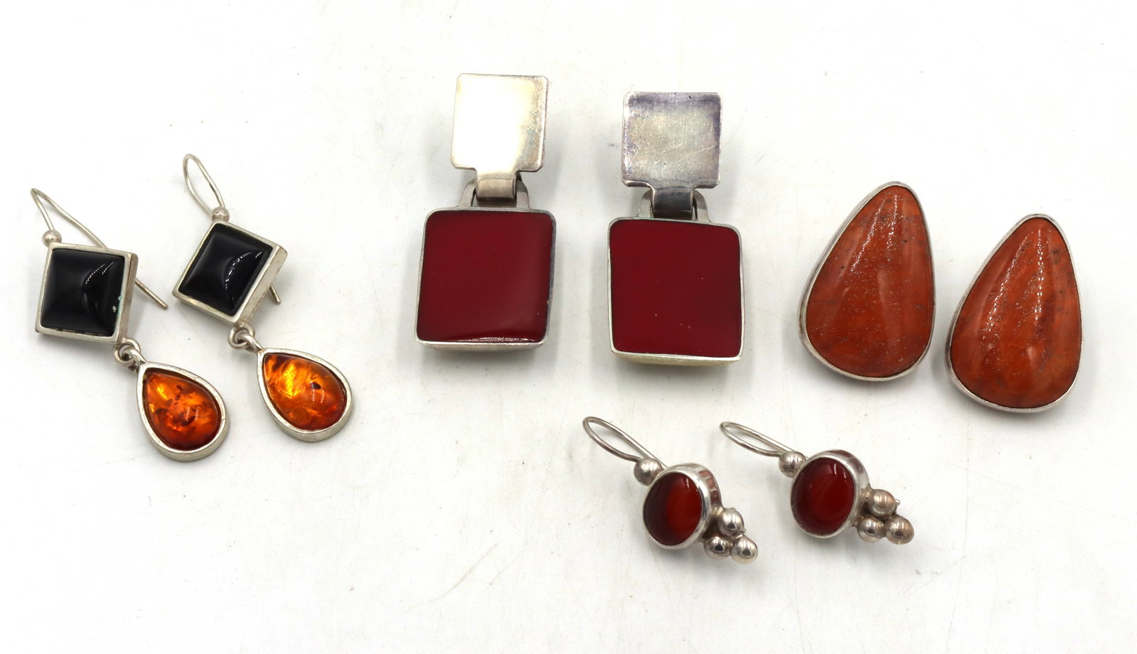 4 Pairs of 925 sterling silver gemstone earrings: 4 Pairs of 925 sterling silver gemstone earrings. The total weight of the lot is 36.1 grams.