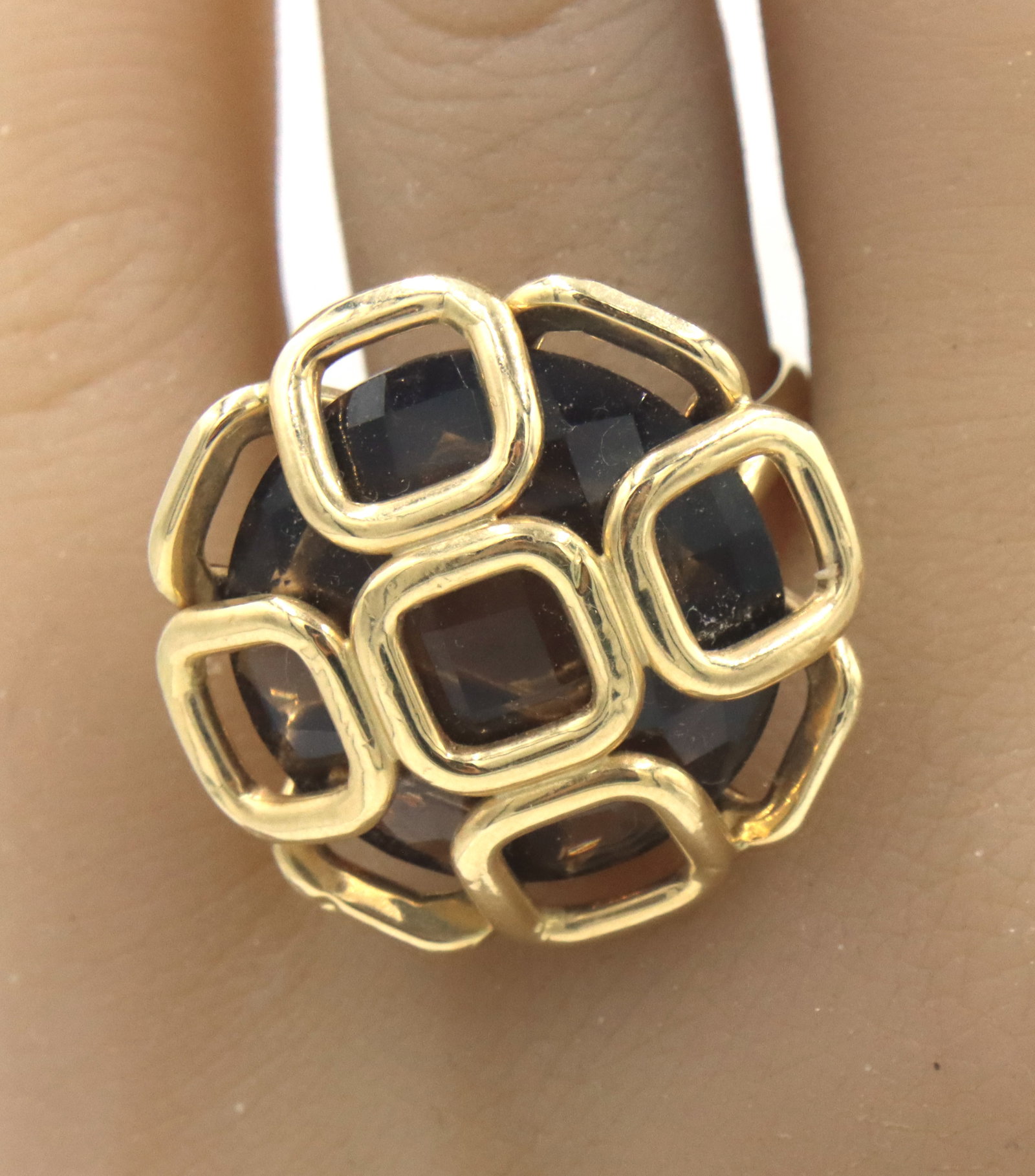 Milor Italian 14kt Yellow gold smokey quartz ring: Milor Italian 14kt Yellow gold smokey quartz ring. The total weight of the ring is 6.2 grams. Ring size 9.5".