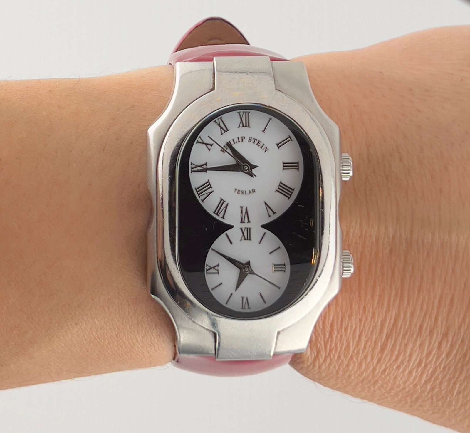 Philip Stein signature large dual time zone watch: Philip Stein Large Model Dual Time Zone With Red Patent Leather Strap. Comes With Two Extra straps and a Pouch.