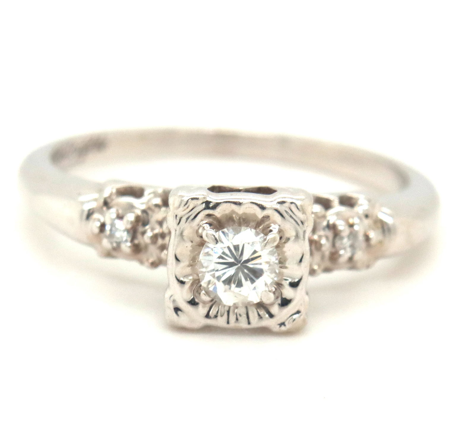 14kt White gold RBC diamond ring: 14kt White gold round brilliant cut diamond ring. The total weight of the ring is 2.9 grams. Ring size 6".