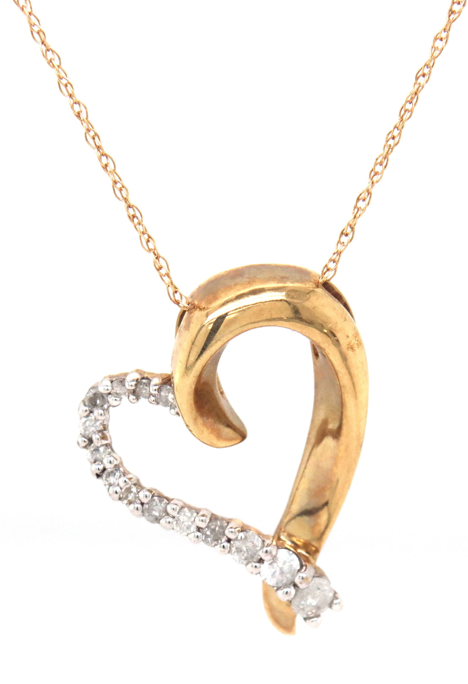 10kt Yellow gold diamond heart shaped pendant on chain (1 of 4)