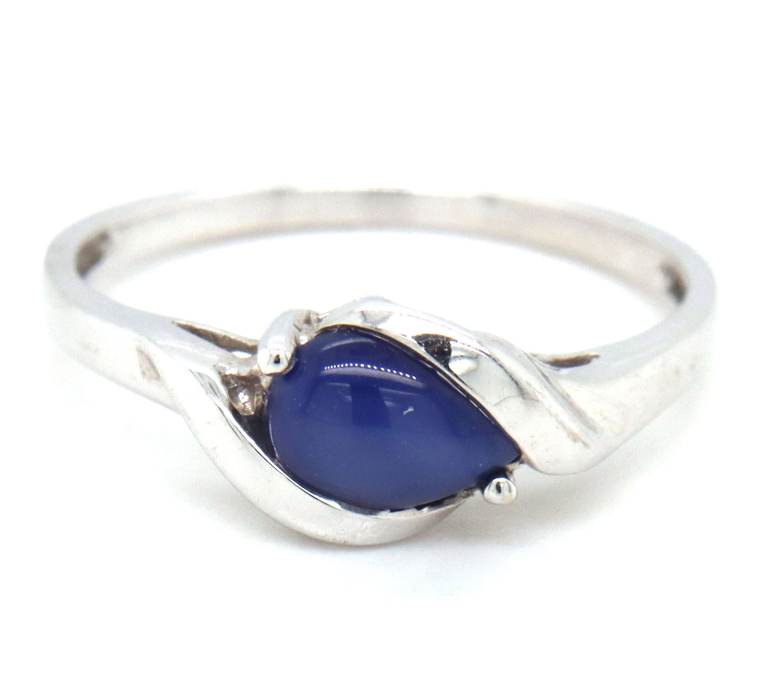 14kt White gold blue sapphire ring: 14kt White gold blue sapphire ring. The total weight of the ring is 2.2 grams. Ring size 7".
