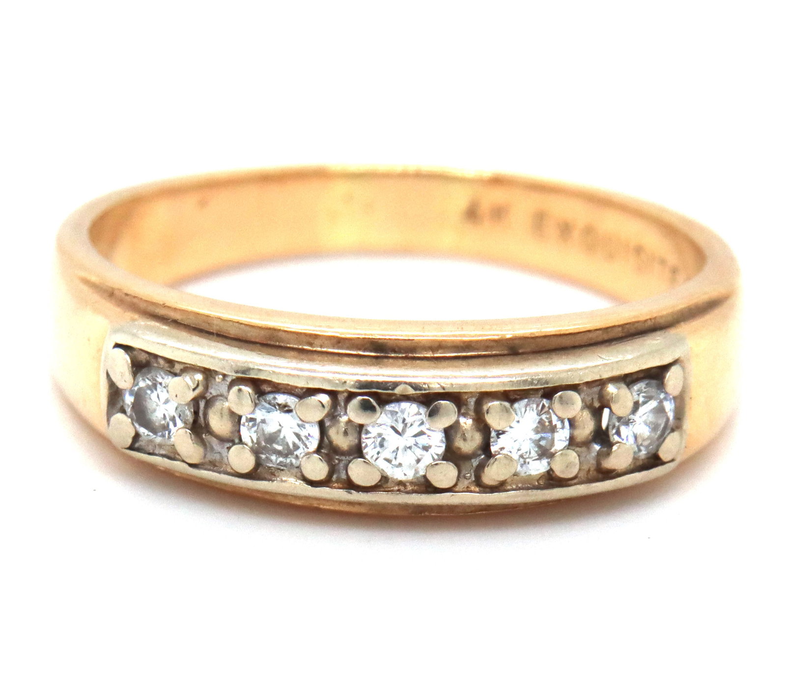 14kt Yellow gold diamond band: 14kt Yellow gold diamond band. The total weight of the band is 5 grams. Ring size 8".