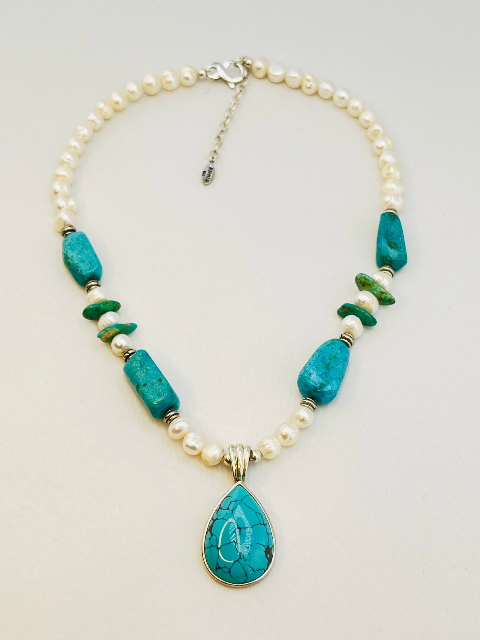 925 Sterling Silver Barse Signed Turquoise And Pearl necklace With Tear Drop Pendant: 925 Sterling Silver Barse Signed Native American Style Turquoise And Pearl With Tear Drop shape Turquoise Pendant. 46.8 grams. 19 inches