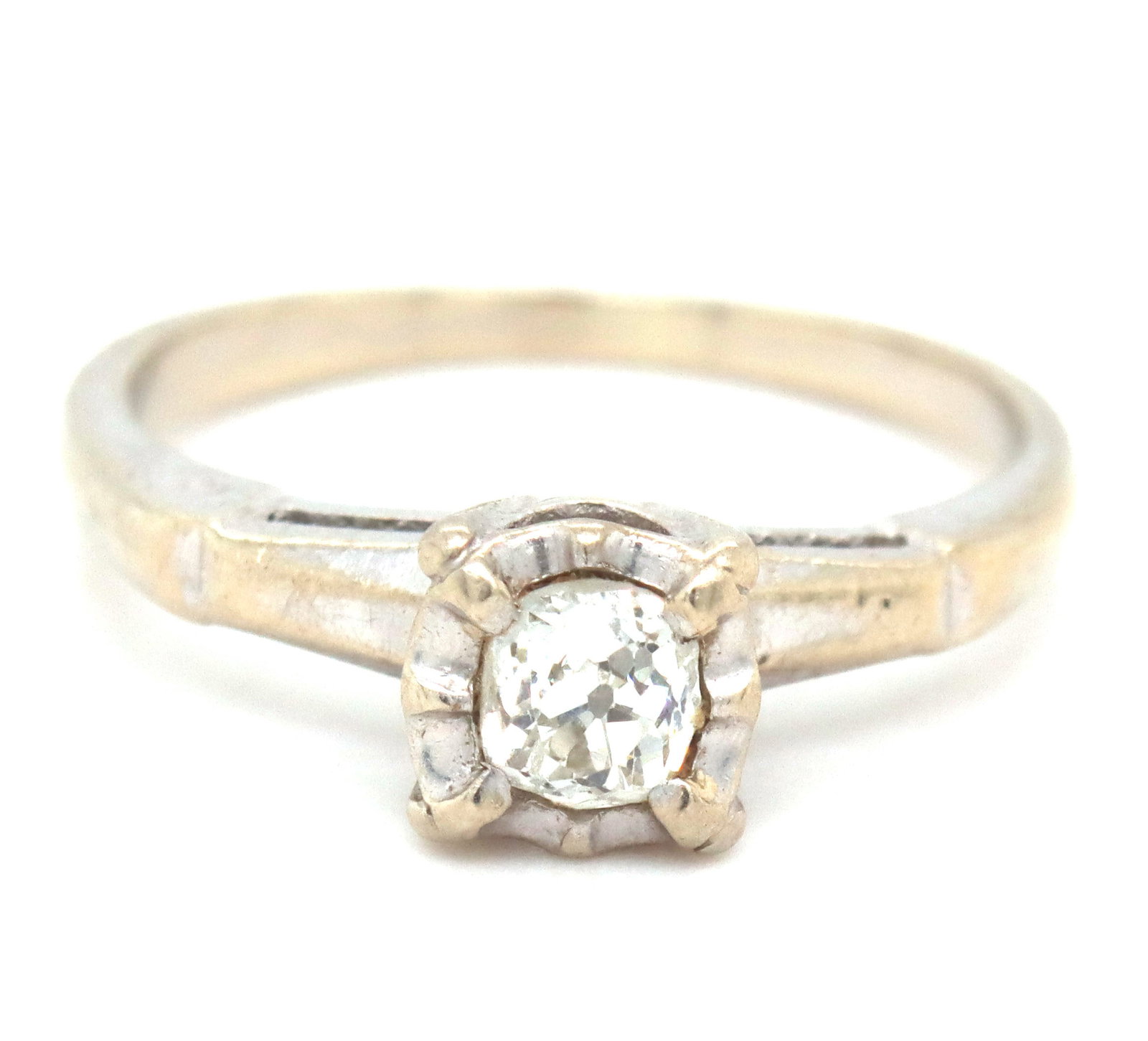 14kt White gold mine cut diamond ring: 14kt White gold mine cut diamond ring. The total weight of the ring is 2.4 grams. Ring size 5.5".