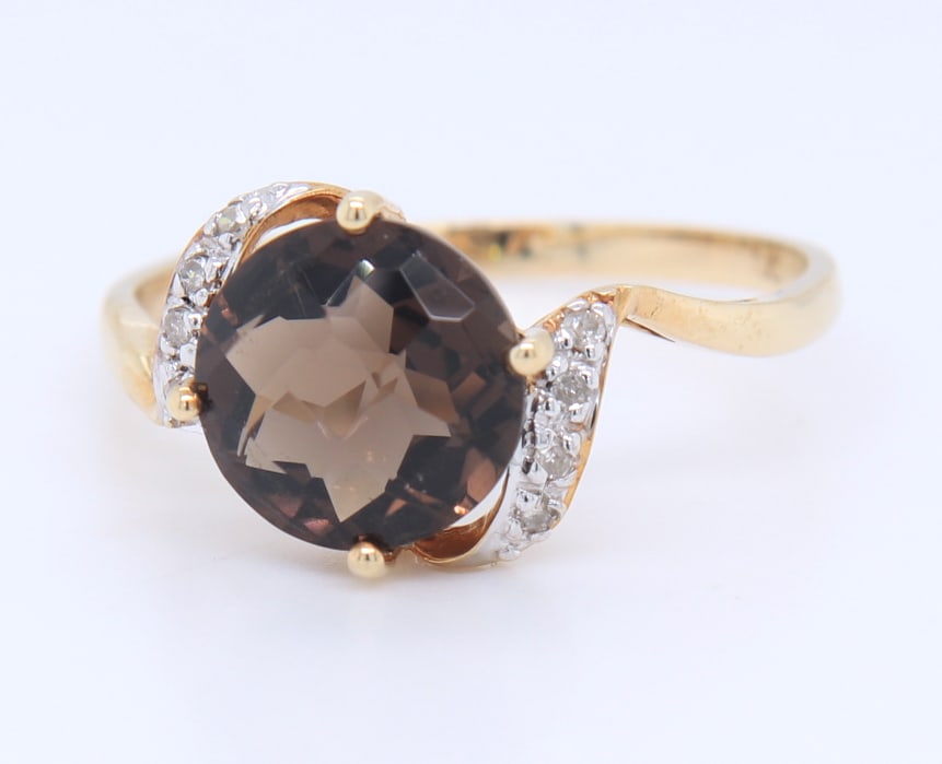 10KT Yellow Gold Smokey Quartz Cocktail Ring: 10KT Yellow Gold Smokey Quartz Cocktail Ring. Total weight of Ring: 2.82 Grams. Size: 7.