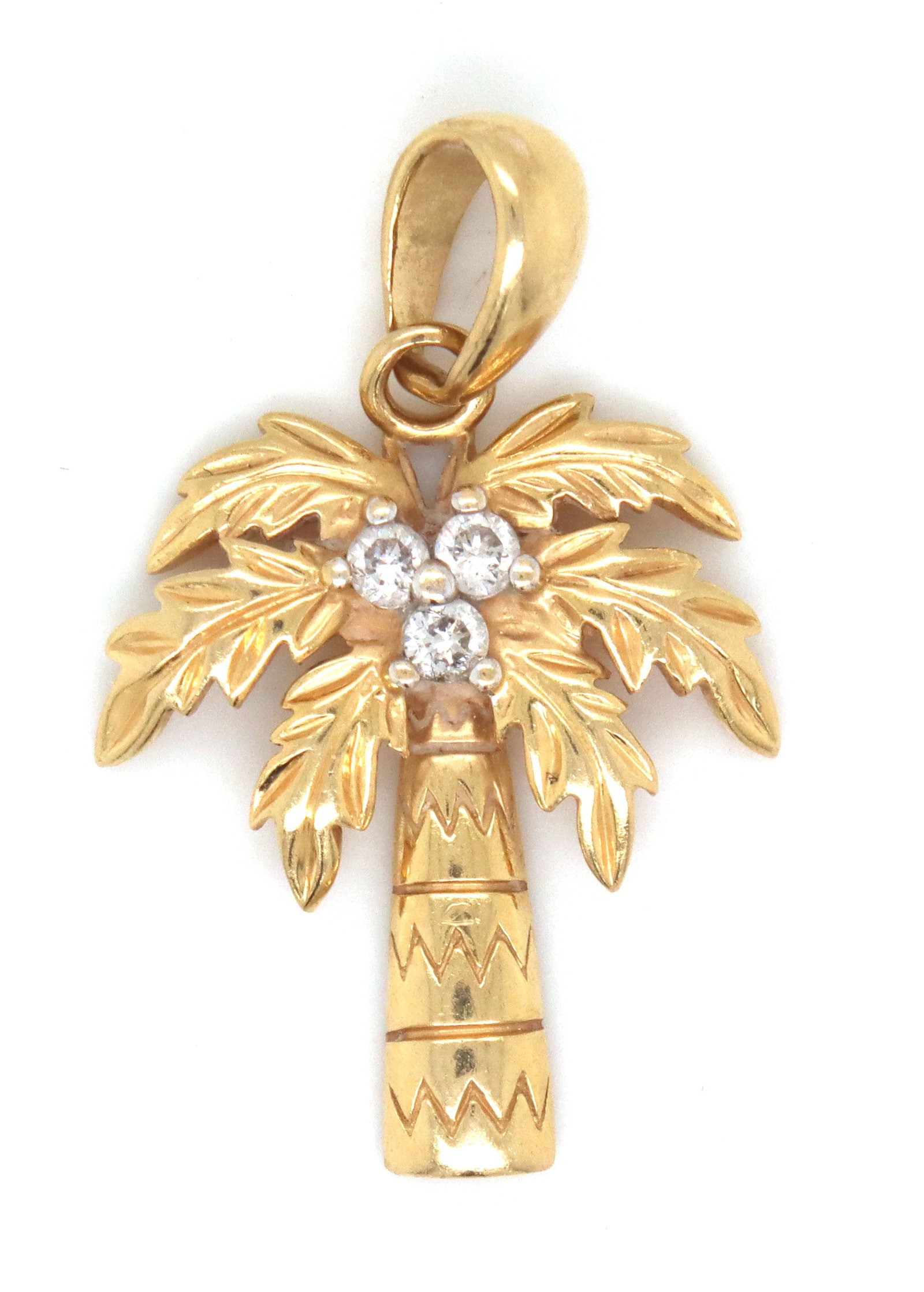 14kt Yellow gold Palm tree pendant: 14kt Yellow gold Palm tree pendant. The total weight of the pendant is 2.1 grams.