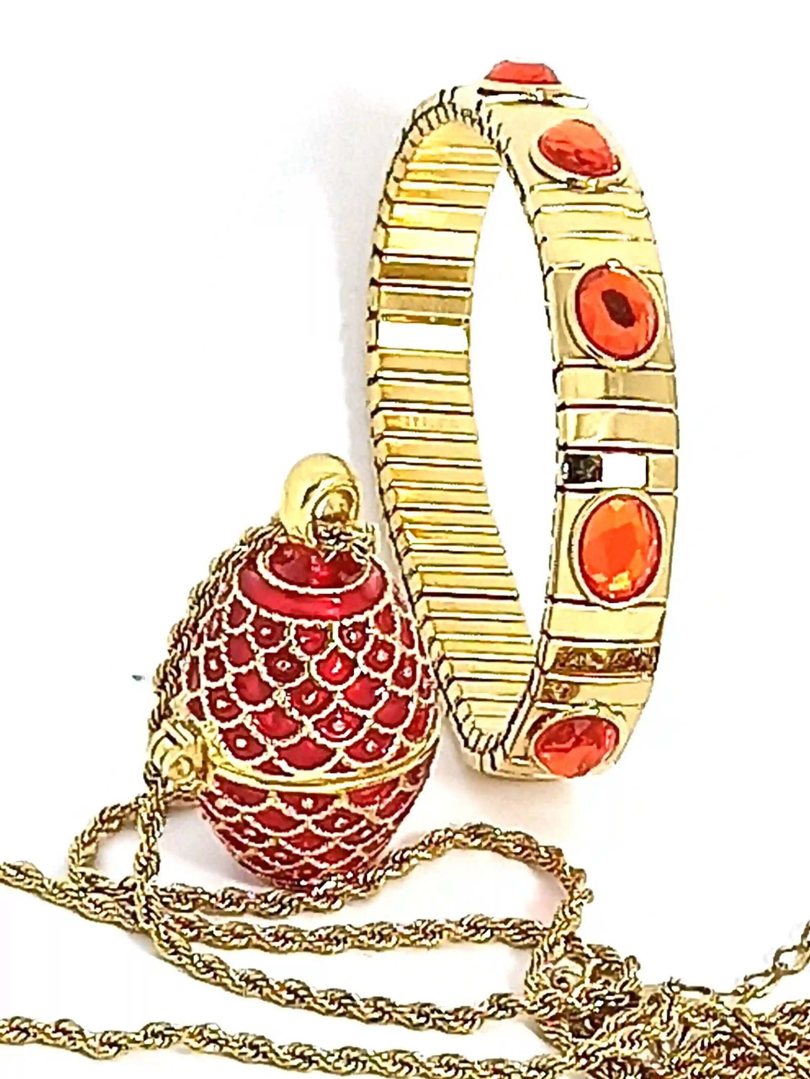 Red Guilloch? Sterling Silver Egg Pendant & Bracelet Set with 24K Gold Accents: Indulge in timeless European elegance with this exquisite red guilloch? egg pendant and bracelet set, masterfully handcrafted in sterling silver and adorned with radiant 24K gold detailing. Inspired