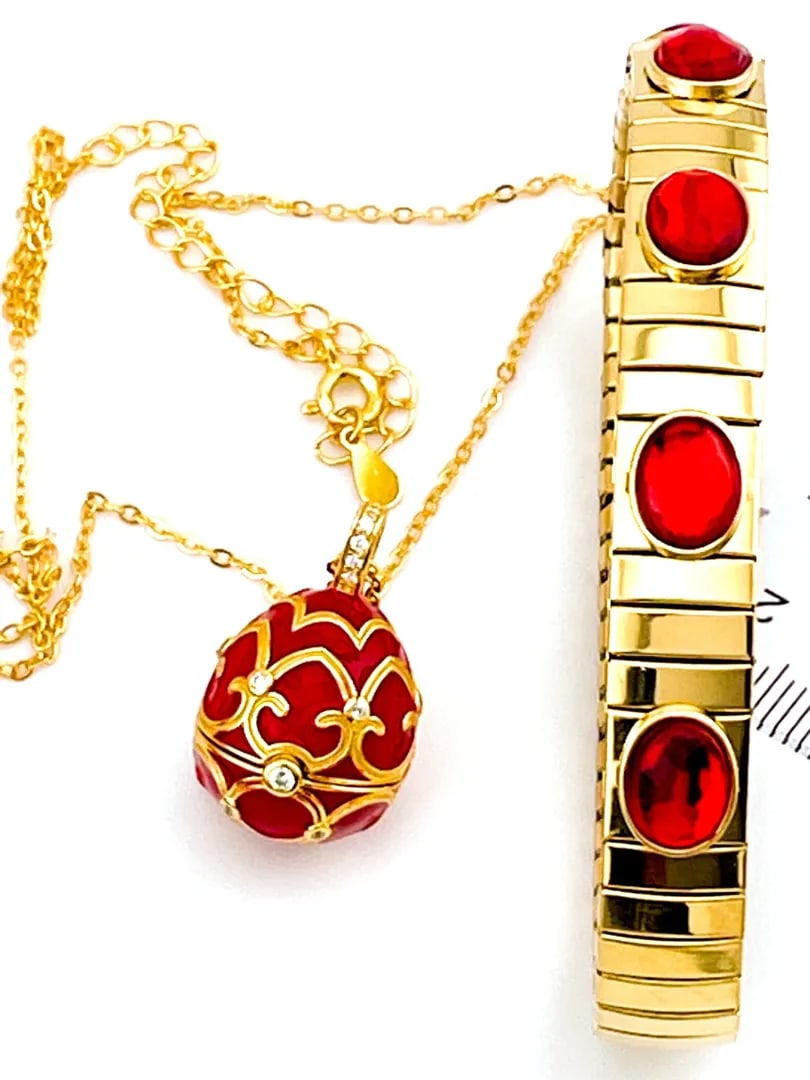 Ruby-Inspired Egg Pendant & Bracelet Set ? 18K Gold Vermeil Jewelry for Special Occasions: Elegant Egg-Inspired Jewelry SetThis exquisite 18K Yellow Gold Vermeil egg-style pendant and matching bracelet are crafted in solid sterling silver, showcasing exceptional artistry and sophistication.