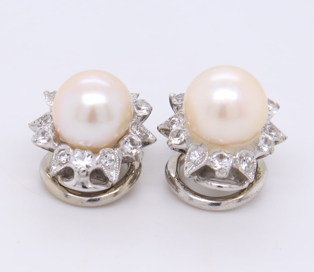 Powerful 18kt Pearl and Cubic Zirconia Button Earrings: Powerful 18kt White Gold White Fresh Water Pearl and Cubic Zirconia Button Earrings. Total weight of Earrings 5.50 Grams.