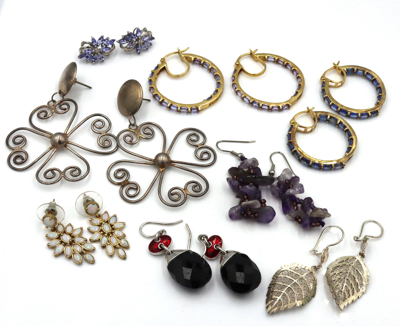 8Pairs of 925 sterling silver earrings: 8Pairs of 925 sterling silver earrings. The total weight of the lot is 78.5 grams.
