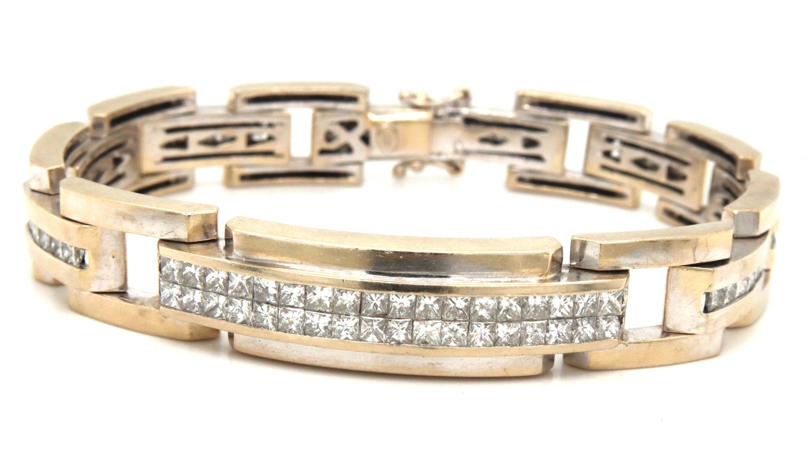 18KT White Gold Princess Cut Diamond Link Bracelet 8.25 Inches with Certificate: 18kt White gold princess cut diamond link 8.25-inch bracelet. The total weight of the bracelet is 77.9 grams. Comes with a certificate. Crafted in luxurious 18KT white gold, this striking diamond