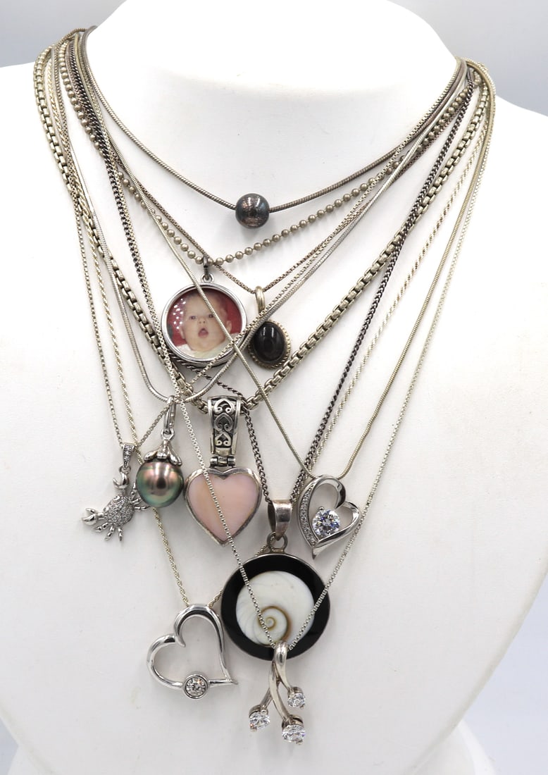 Group lot of 10 Vintage 925 sterling silver necklaces: Group lot of 10 Vintage 925 sterling silver necklaces. Total weight of lot is 66.3 grams.