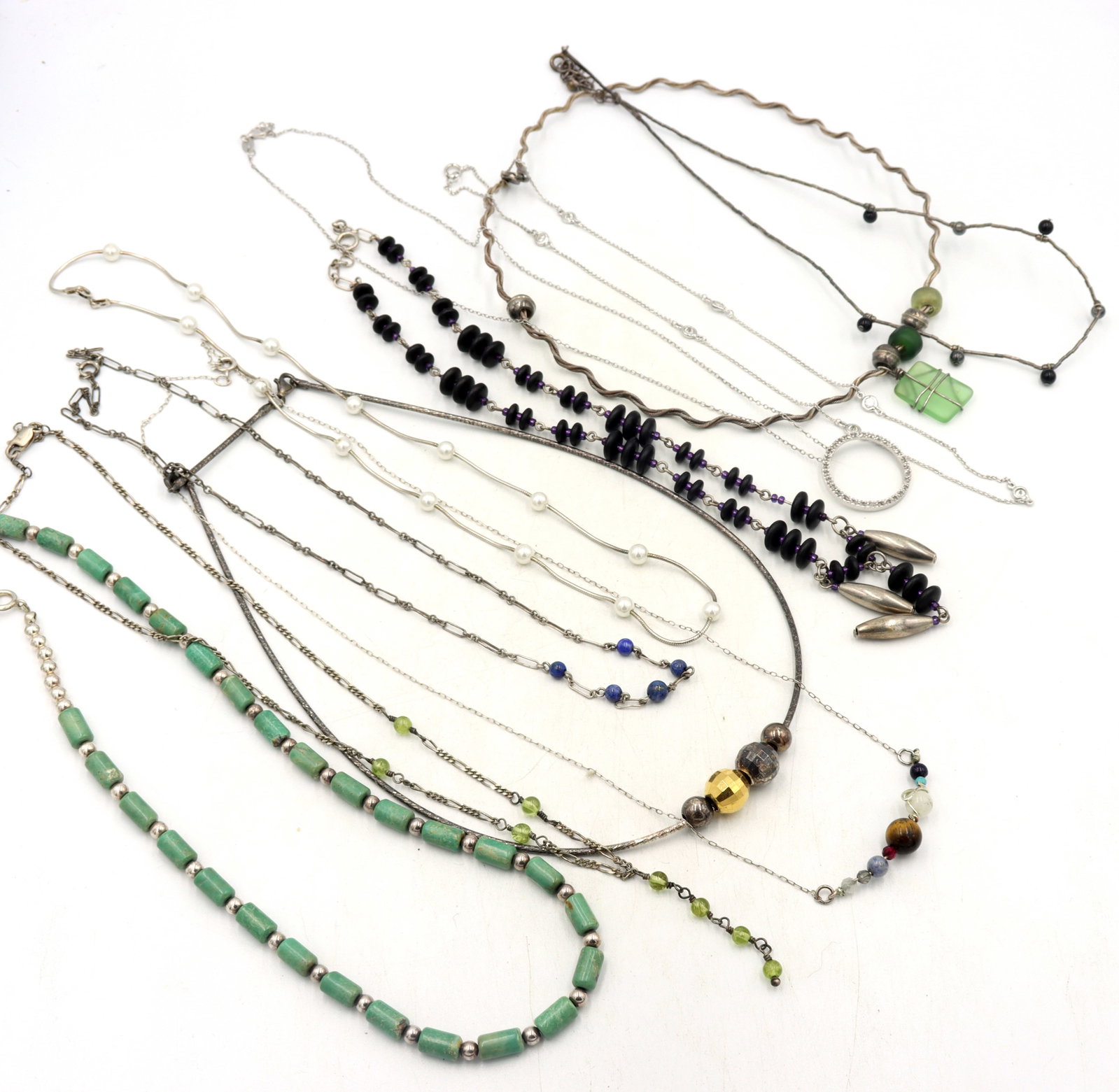 Group lot of 11 Vintage 925 sterling silver necklaces: Group lot of 11 Vintage 925 sterling silver necklaces. Total weight of lot is 84.7 grams.
