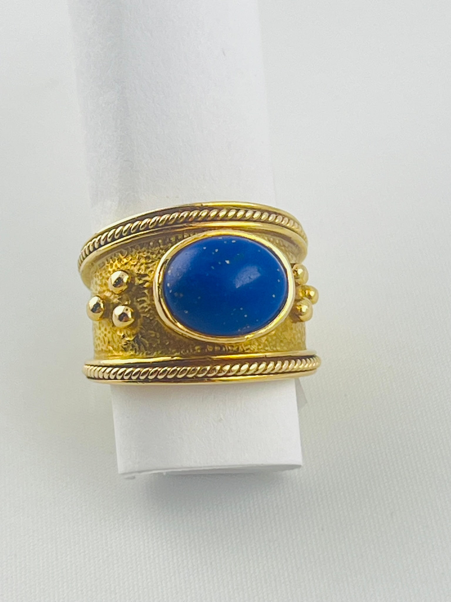 14KT Yellow Gold Etruscan Style Lapis Ring: 14KT Yellow Golds Estrucan Style With Beautiful Lapis Stone Center. This ring is a small size - Nice pinky ring. 8 grams