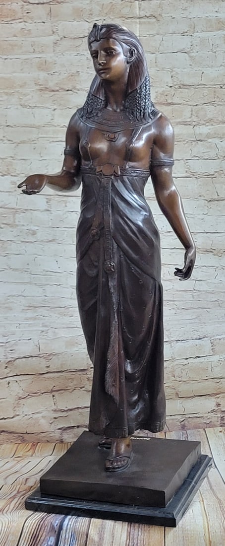 Egyptian Revival Royal princess Bronze Figurine: A very nice, big Sculpture, this Art Deco Bronze Egyptian princess on Marble base. Once of the best creations of the artist Giancarlo. Relaxed a young prince stand in royal palace. In casual upright p